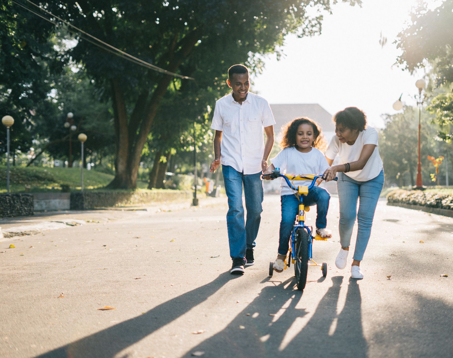 A family out together on a neighbourhood street